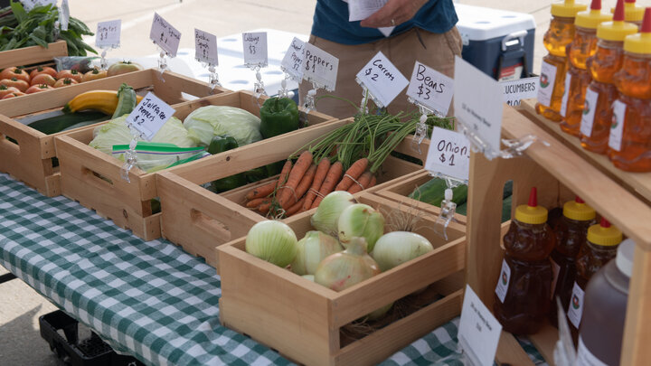 Vendors selling their produce at the Fallbrook Farmers Market in northwest Lincoln, Neb. July 23, 2020.