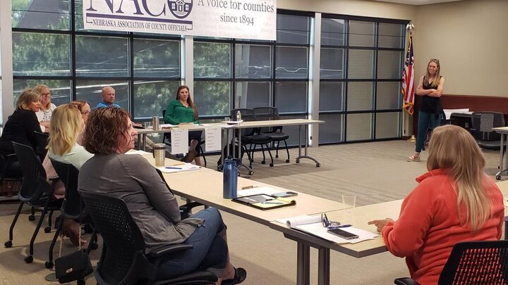 Dr. Lindsay Hastings facilitates a conversation on leadership transition at an in-person session of the Institute of Excellence held in Lincoln in 2021. Photographer: Jordan Rasmussen