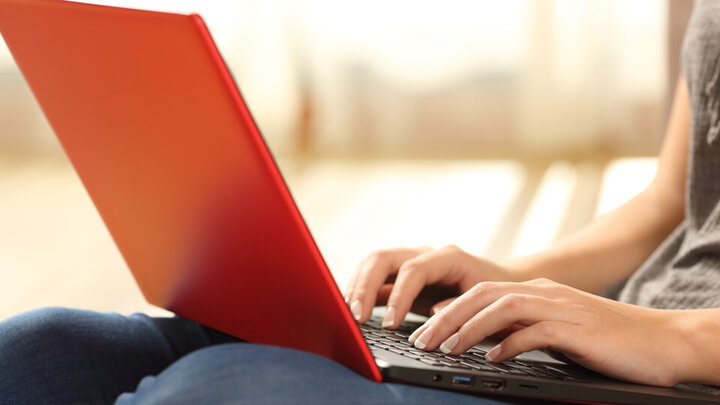 Stock photo of woman working on her laptop.