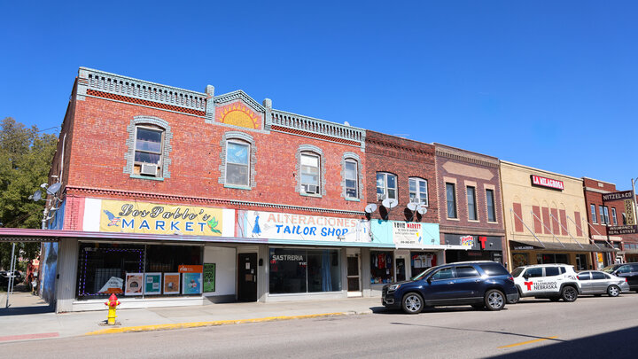 A view of businesses on West 4th Street in Grand Island, with La Milagrosa Supermarket, the starting place of the Sept. 15 walking tour, in the background. Photo by Russell Shaffer