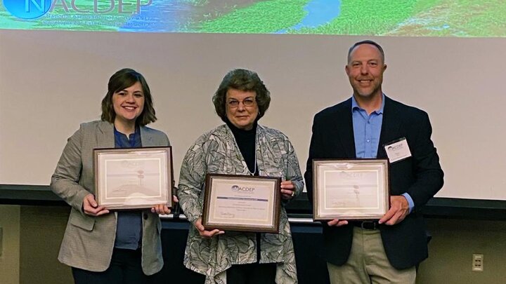 Three Rural Prosperity Nebraska Extension educators receive national awards at the NACDEP Conference. Left to Right: Jordan Rasmussen receiving the Educational Materials award for Jason Tuller, Cheryl Burkhart-Kriesel receiving the Creative Excellence award, and Shawn Kaskie receiving the Excellence in Teamwork award.” Photographer unknown