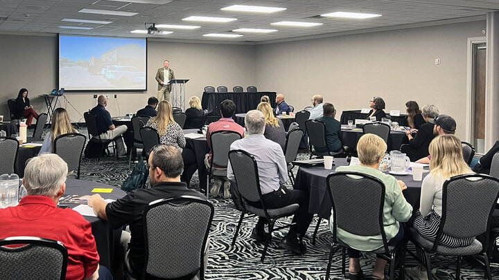 Rural Prosperity Nebraska Extension Educator Shawn Kaskie presents on a food desert study at the 2024 Grocery Industry Summit.” Photo by Charlotte Narjes