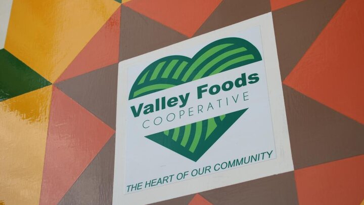 Sign for the Valley Foods Cooperative grocery store in Lynch, Neb.