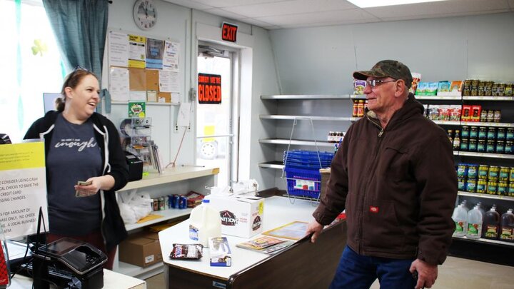 A local from Lynch purchases groceries at Valley Foods Cooperative.