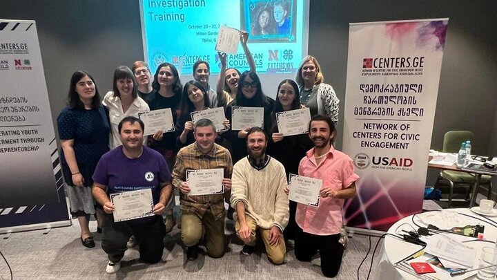 Nebraska Extension educators Molly Brandt (back row, second from left) and Marilyn Schlake (back row, far right), pose with Georgian educators who completed their training program on teaching entrepreneurship education through the merican Councils for International Education in October 2022.