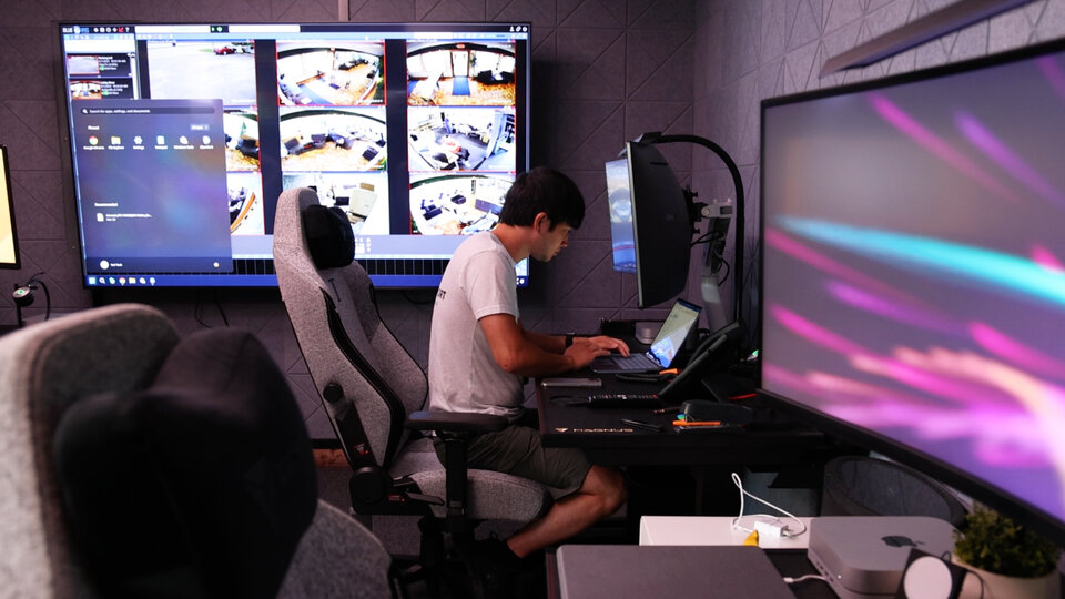 Cody Lawson works in his computer business in Central City, Neb.