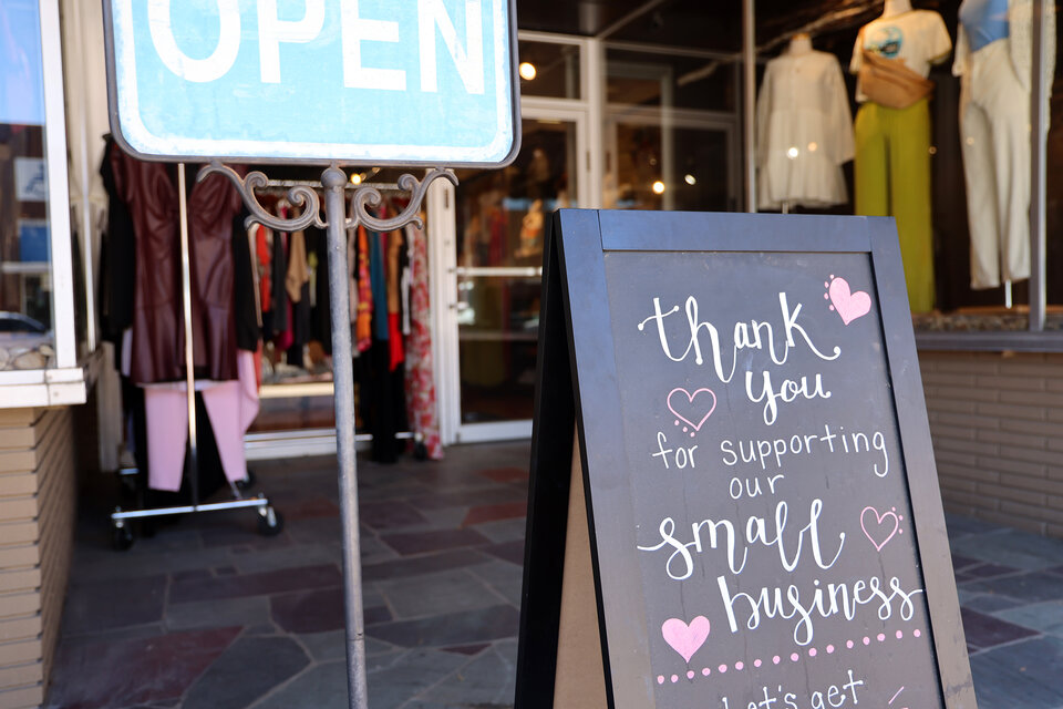 Open sign at a store in downtown Kearney, Neb. Photo by Russell Shaffer
