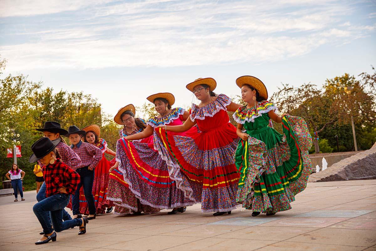 hispanic dancers participating in a local festival